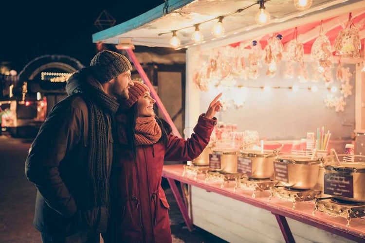 Couple shopping at holiday event